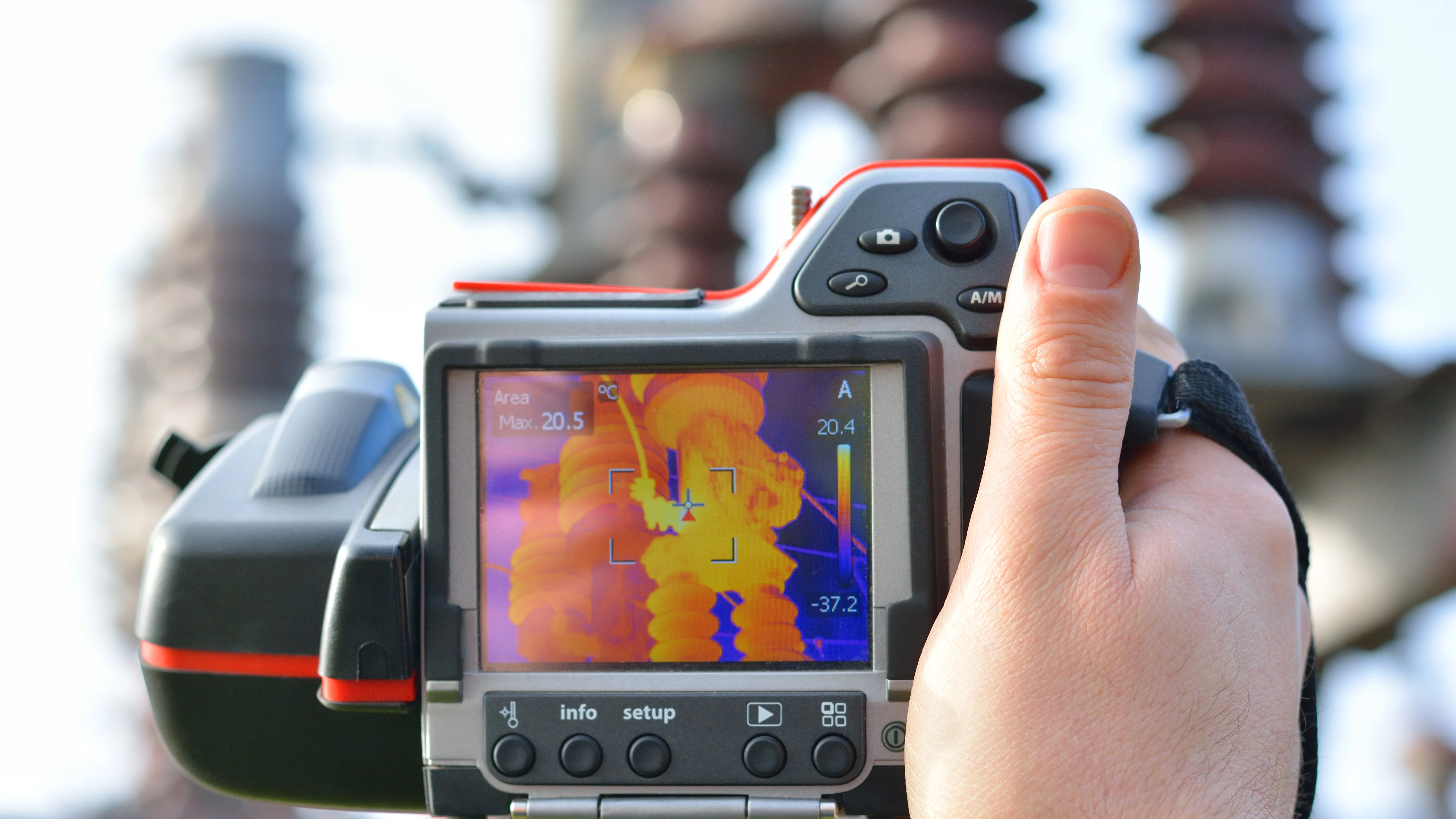 Engineer works with thermal infrared camera.