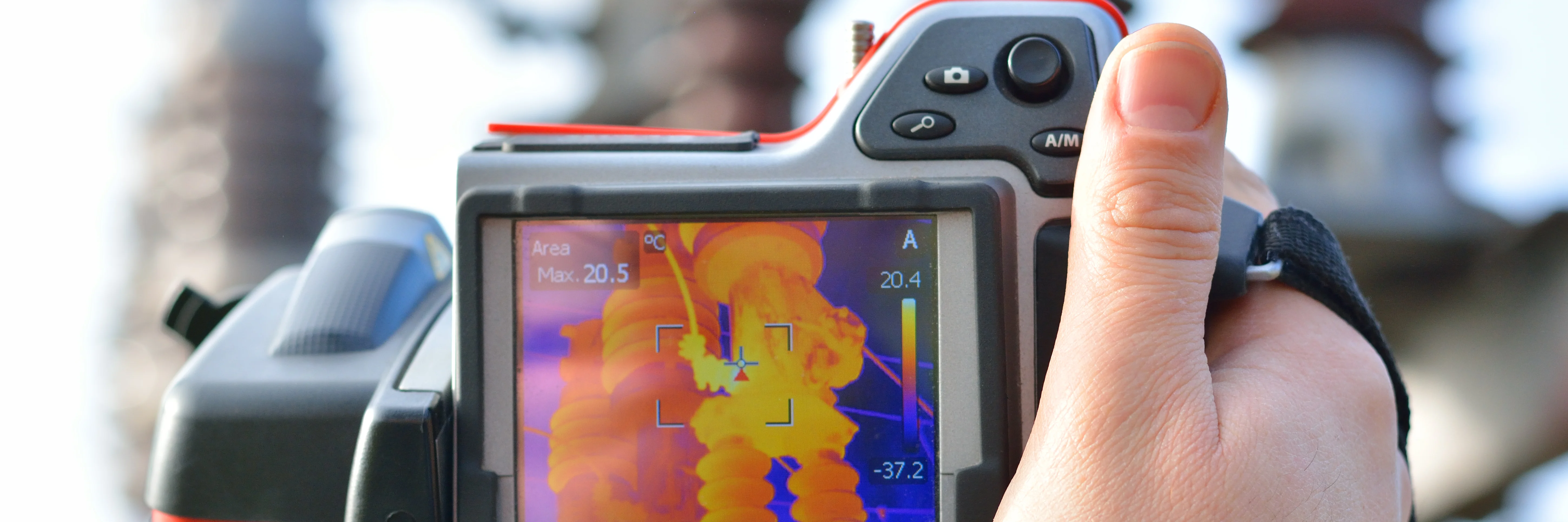 Engineer works with thermal infrared camera.