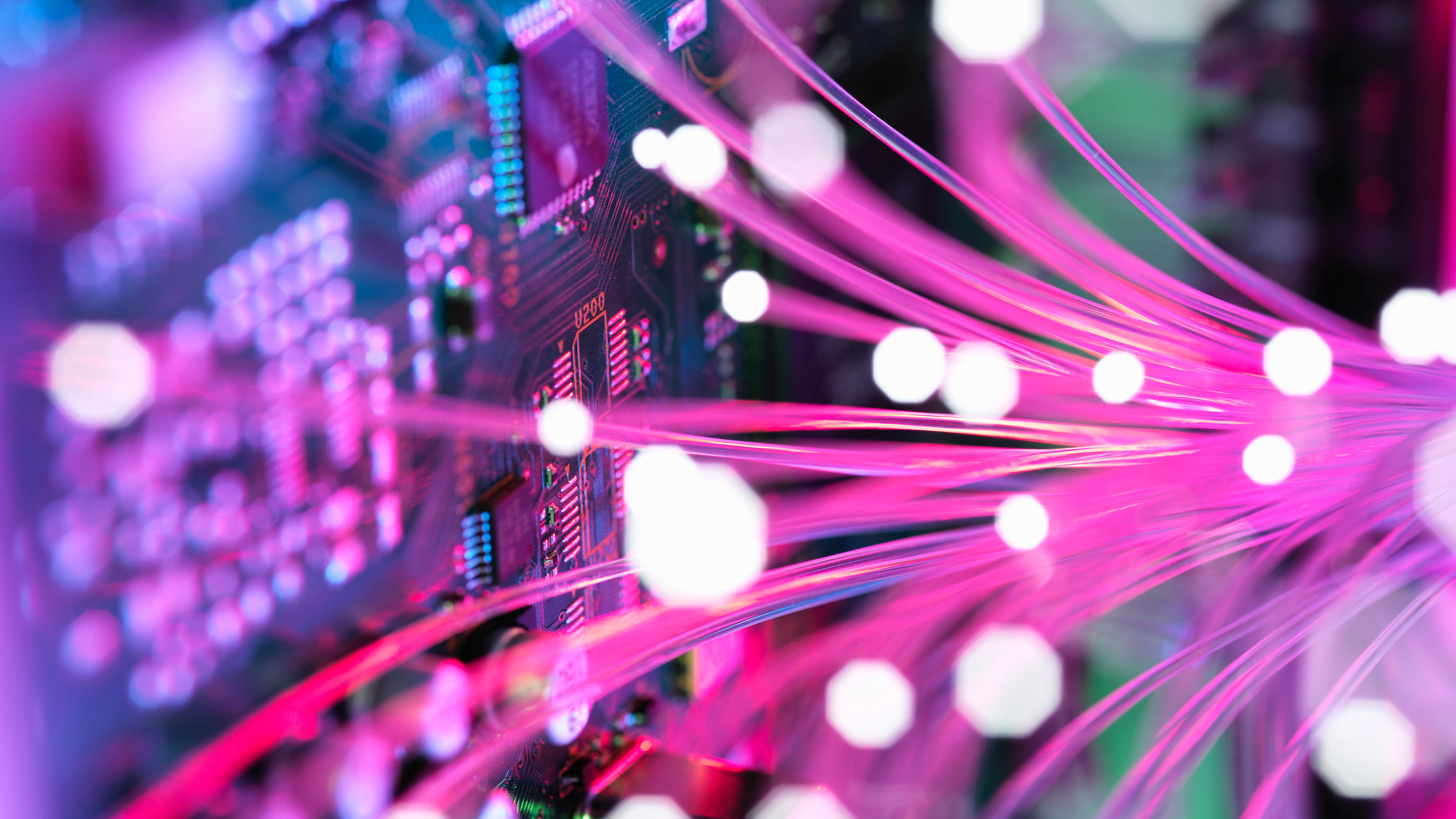 A cyber attack with fibre optics shooting past electronics of broadband hub
