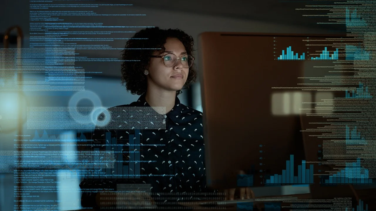 Girl looking at screen with data
