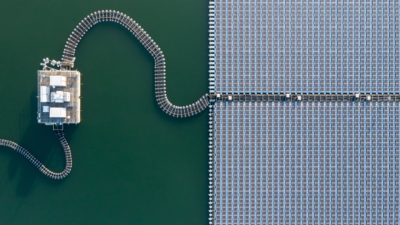 Aerial View of Energy solar power plant on the reservoir