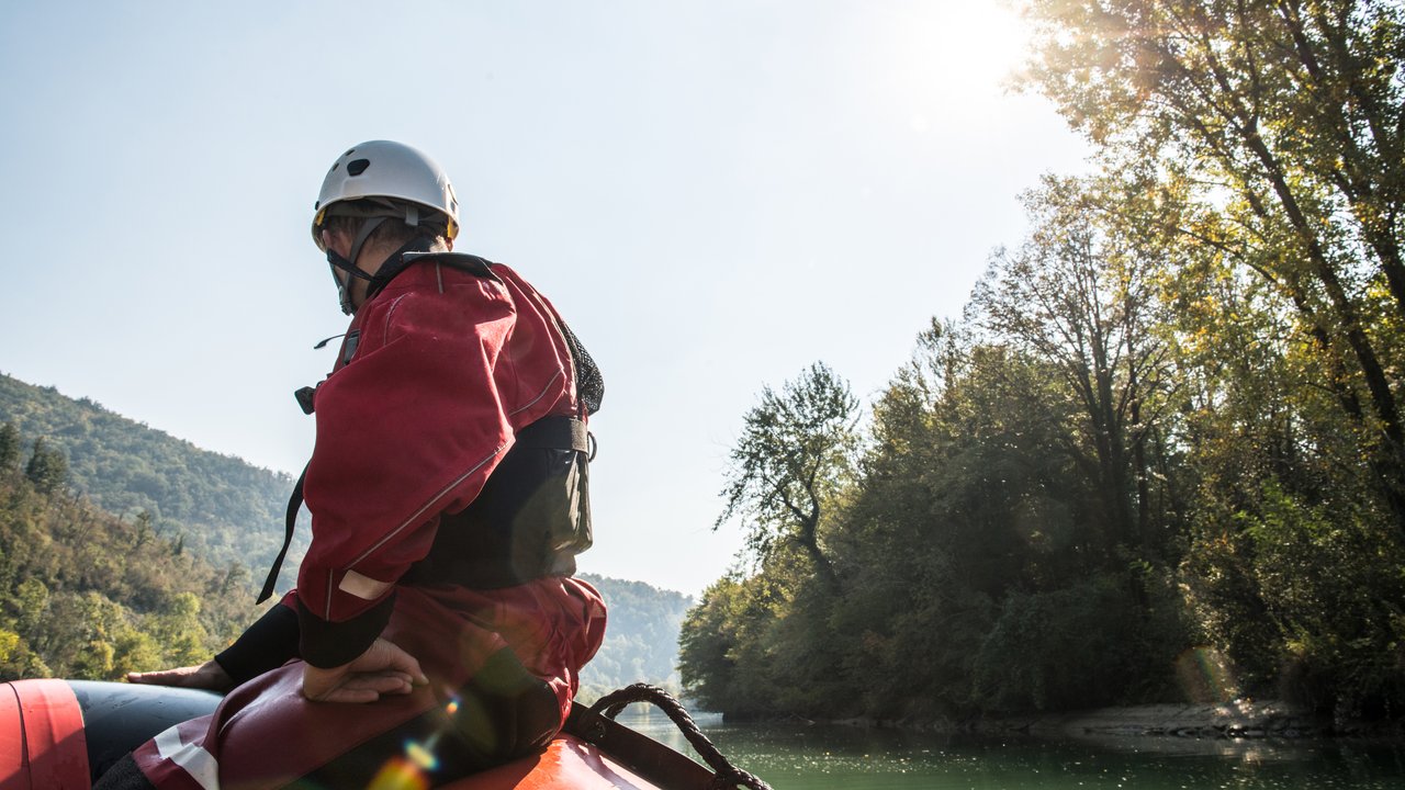 Why a 1-in-100-year event is more likely than you think Rescue worker on a rubber boat on a river