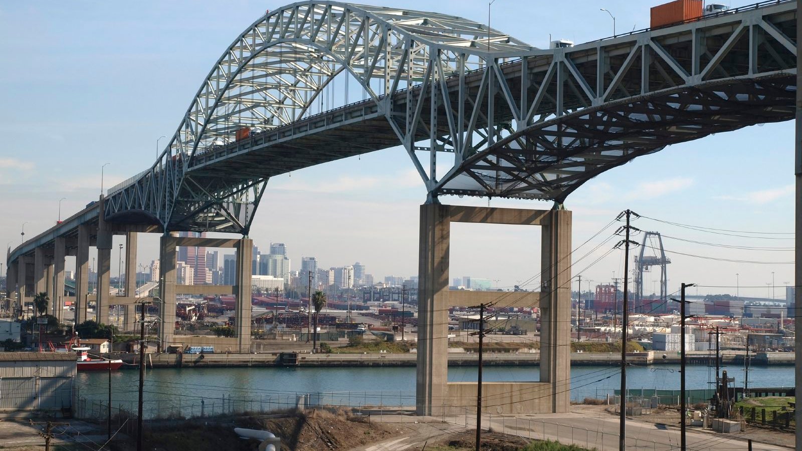 Metal span bridge in and industrial section of Long Beach California. Metal span bridge in and industrial section of Long Beach California.