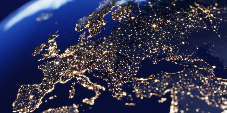 Nighttime View of Europe from Space A satellite view of Europe at night, showing city lights against a dark background.