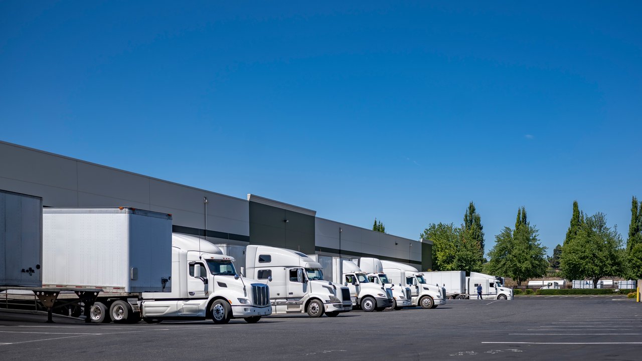 Trucks standing at warehouse dock