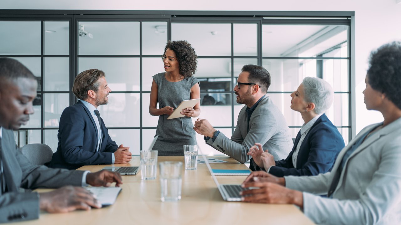 Business woman giving a presentation in the office board room