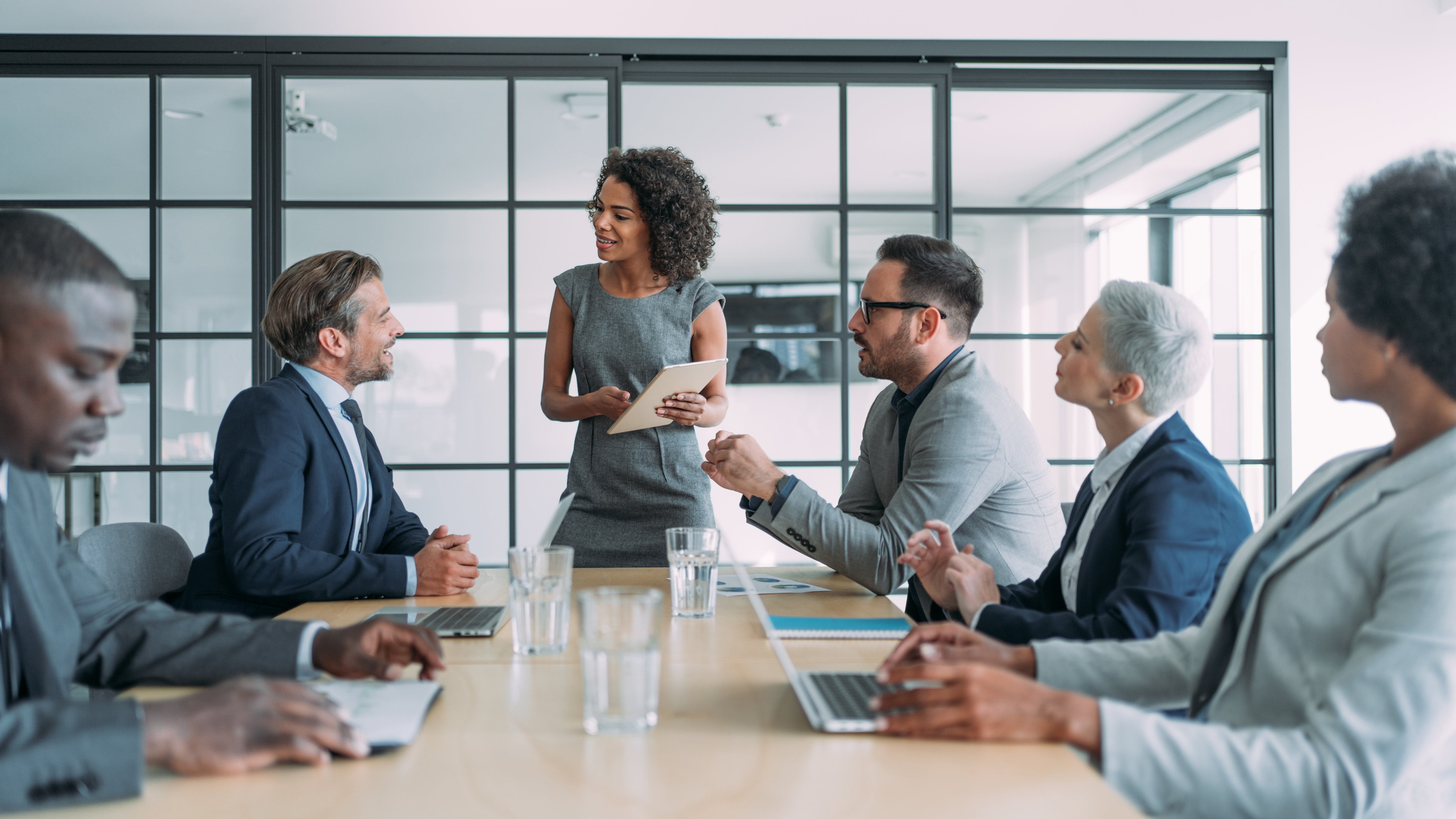 Business woman giving a presentation in the office board room