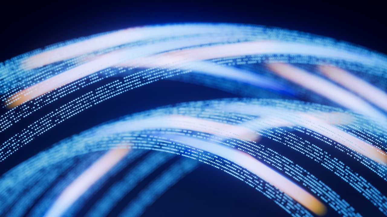 Connecting cyber insurance insights with corporate cyber risk management Abstract blue light trails on a dark background, resembling digital data streams or connectivity.