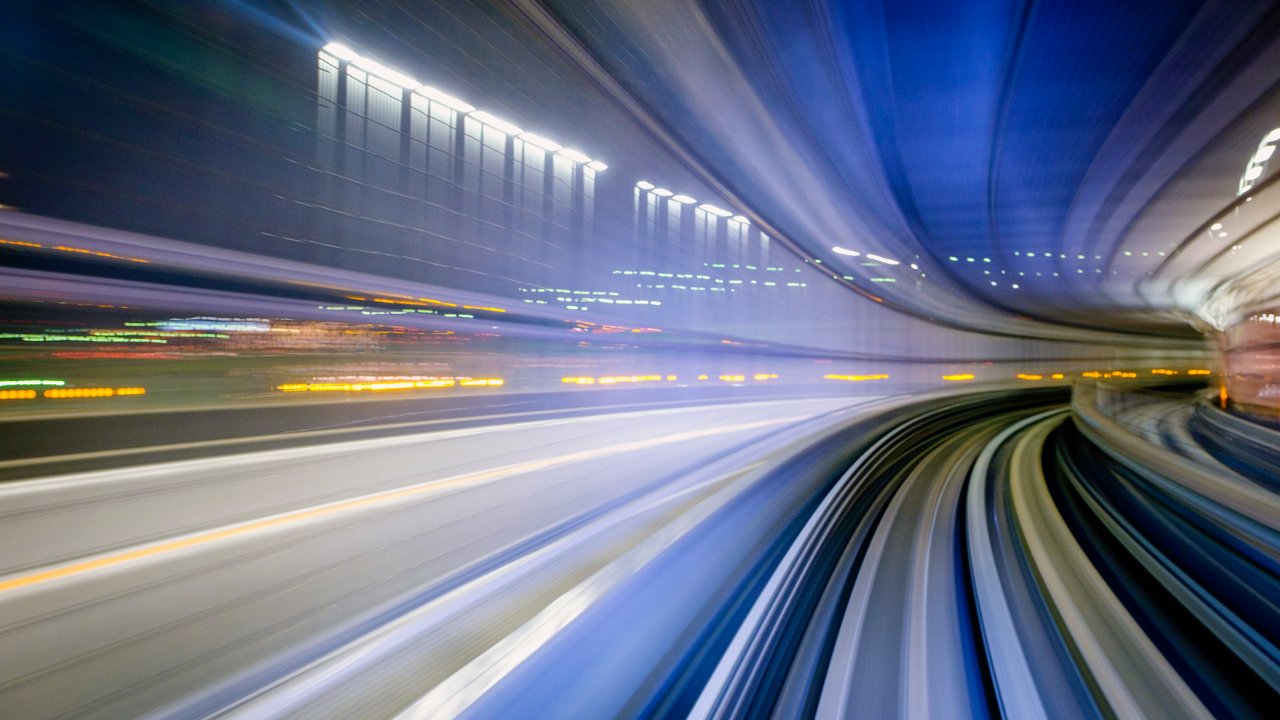 Welcome to Munich Re Train moving fast through a tunnel