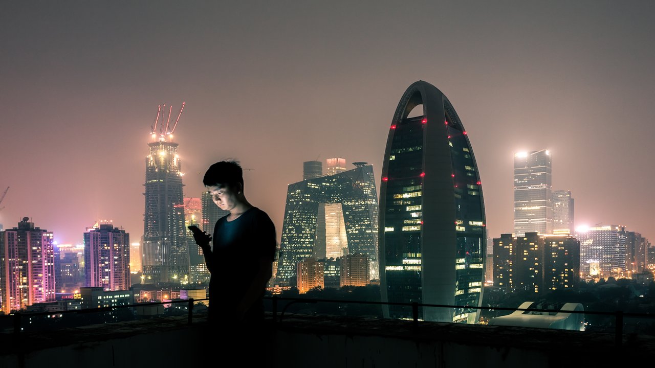 Man looking at smartphone