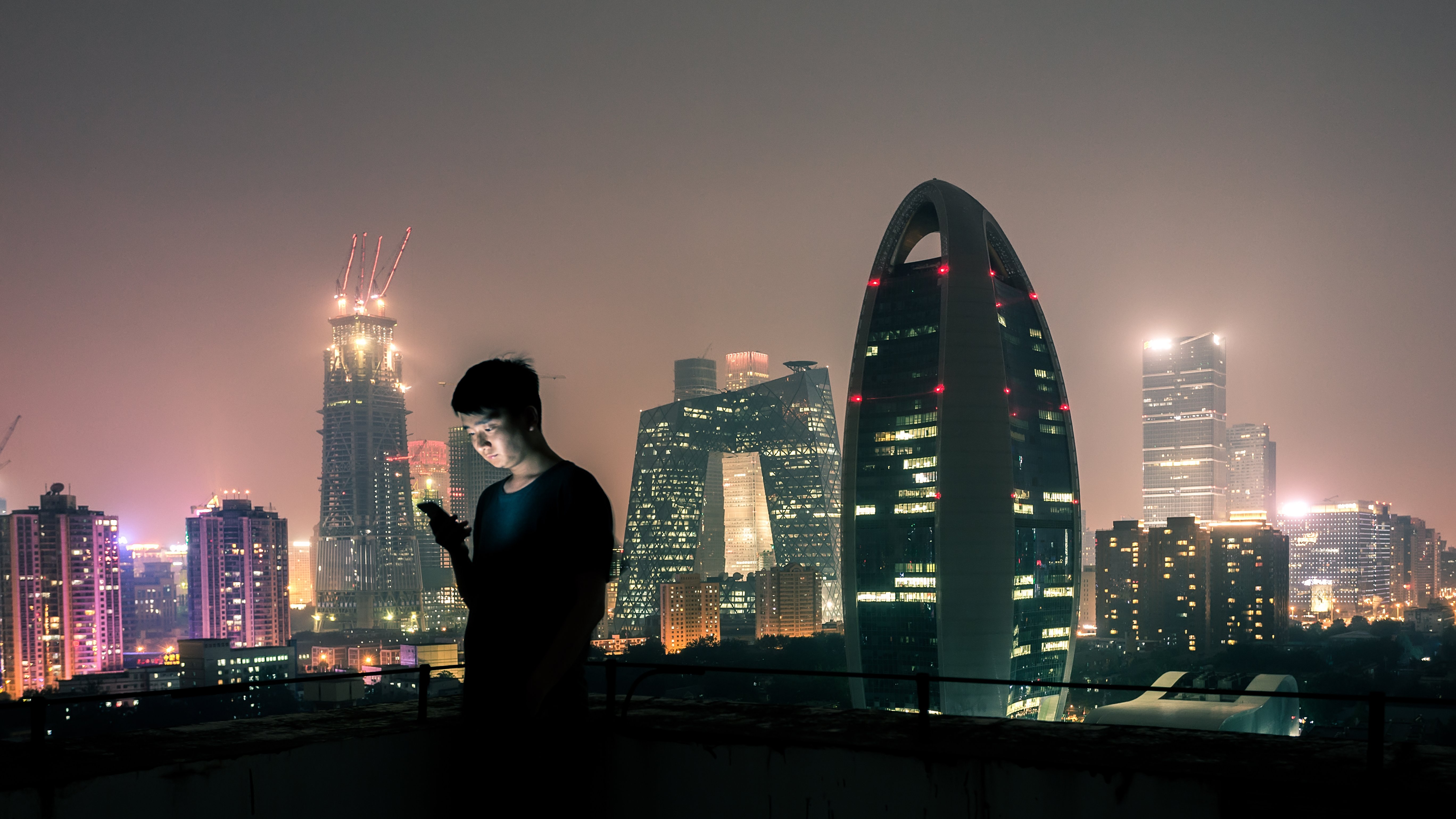 Man looking at smartphone