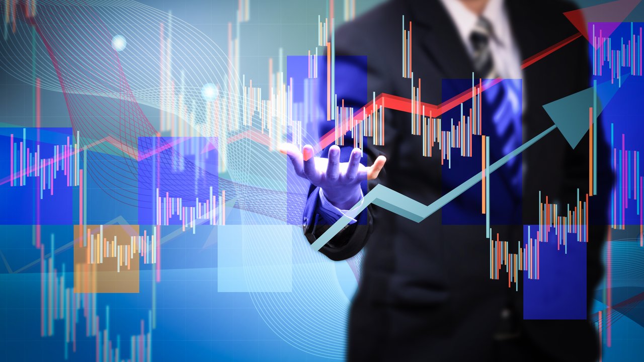 Close up of businessman hand presenting digital charts