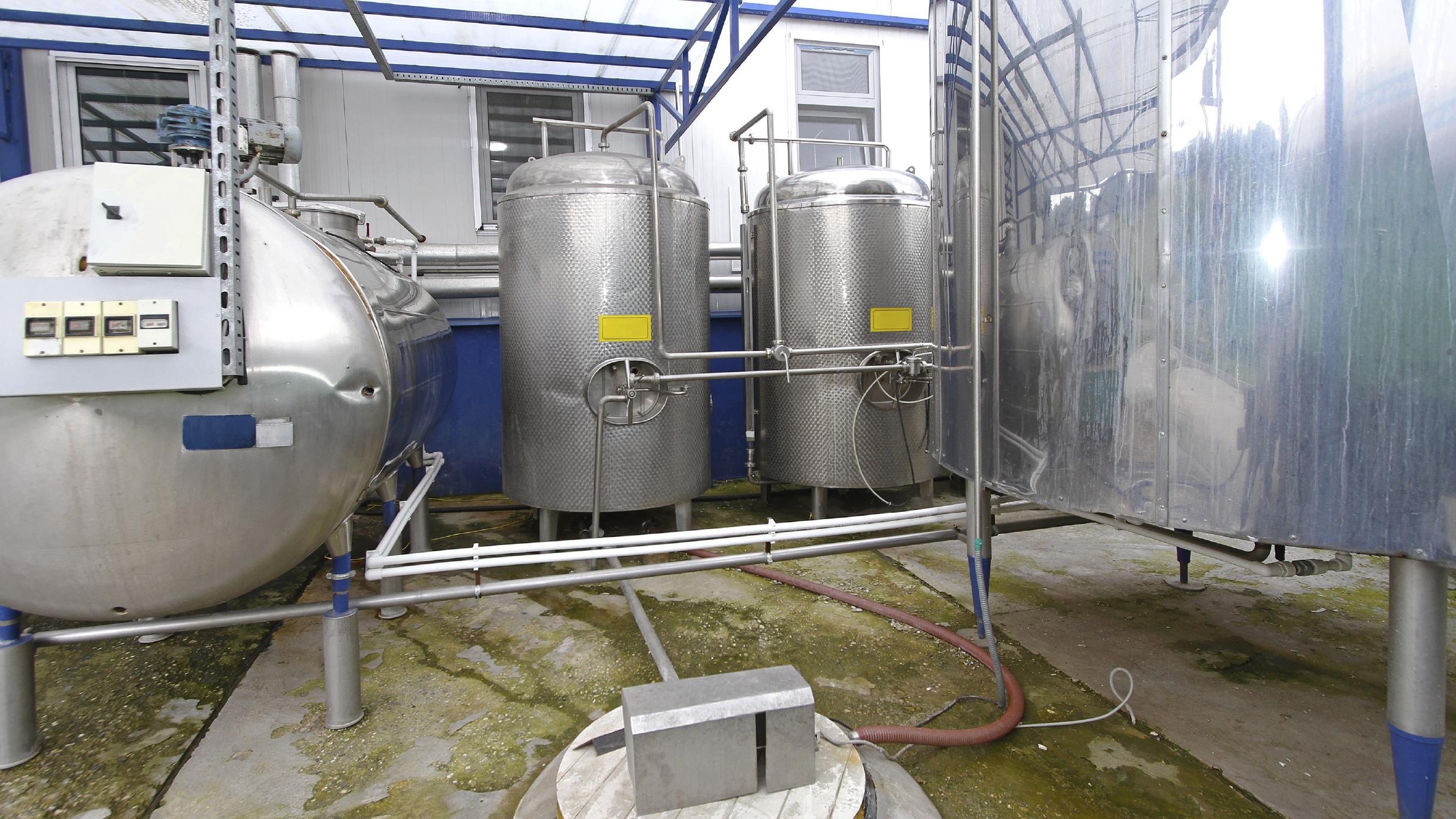 Milk tanks in dairy farm
