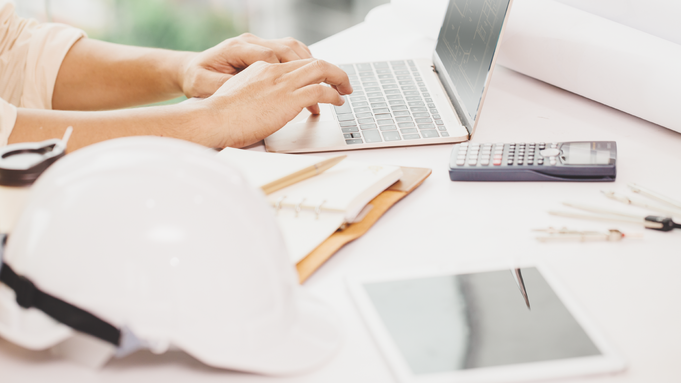 Insurance Engineering – What’s it all about? Account insurance engineer evaluating risk using a laptop