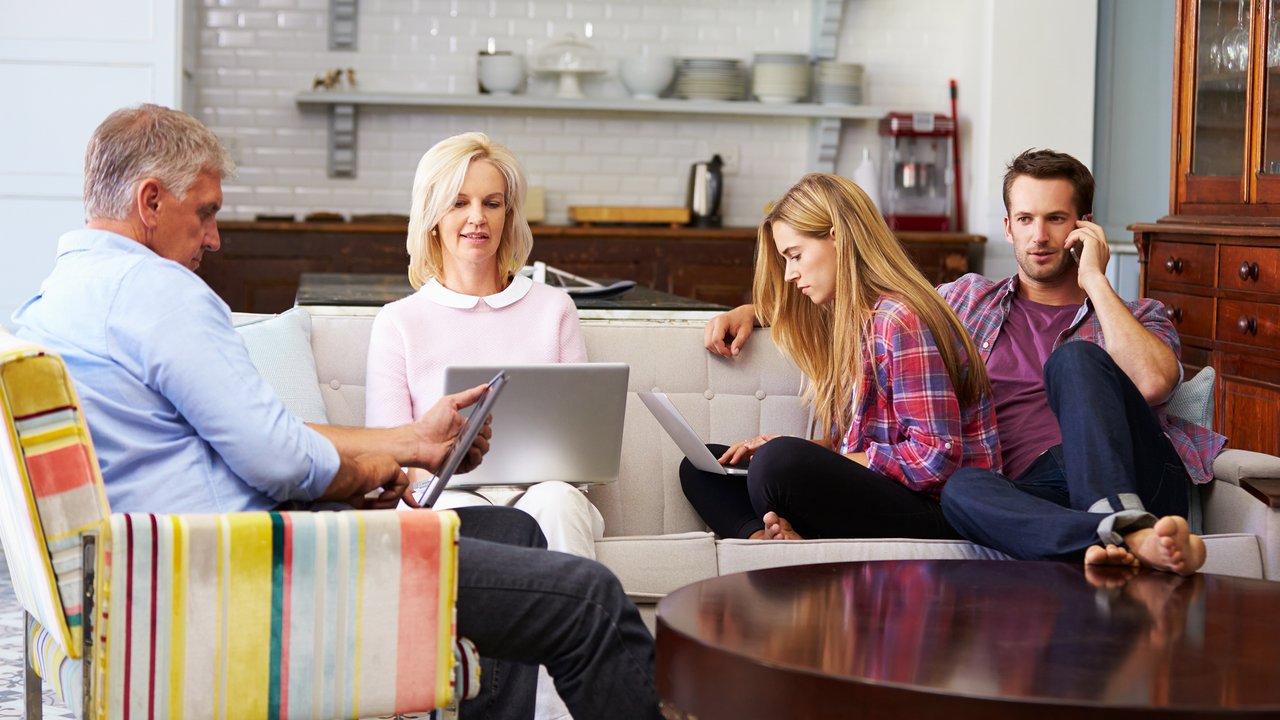 family using digital devices