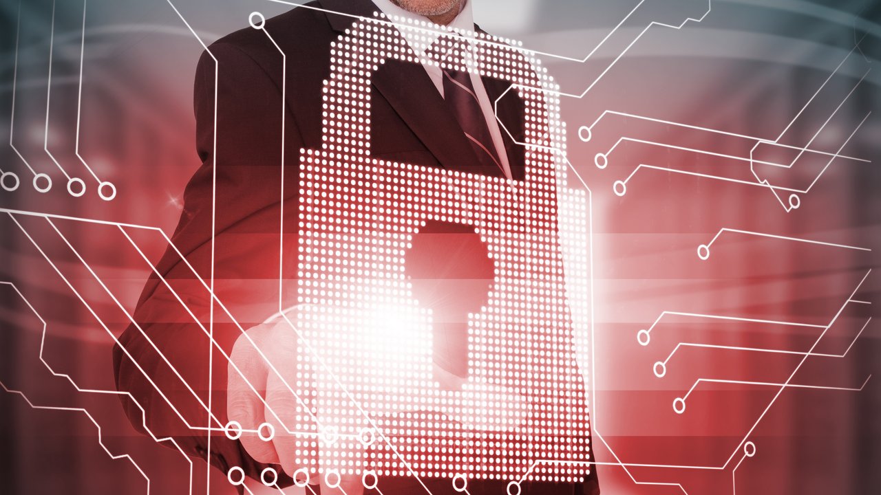 A person pointing at futuristic lock and circuit board interface