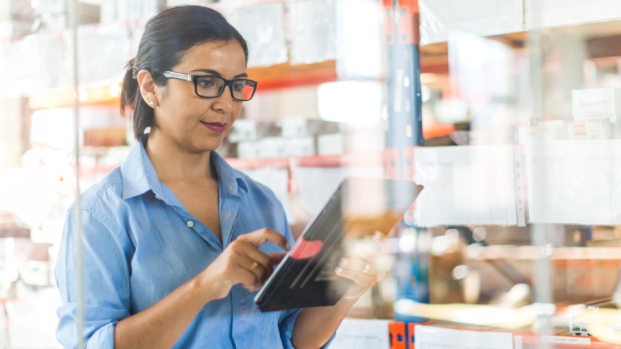 A business owner using a tablet