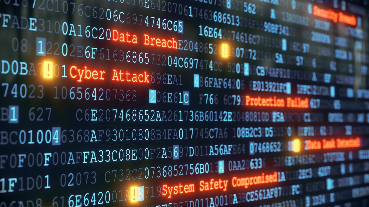 A digital display shows text indicating "Data Breach," "Cyber Attack," and "System Safety Compromised.