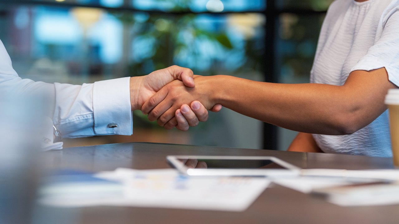 Two people shaking hands
