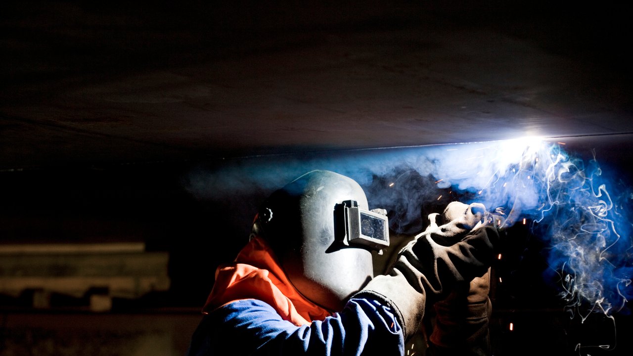 A construction worker conducting hot work