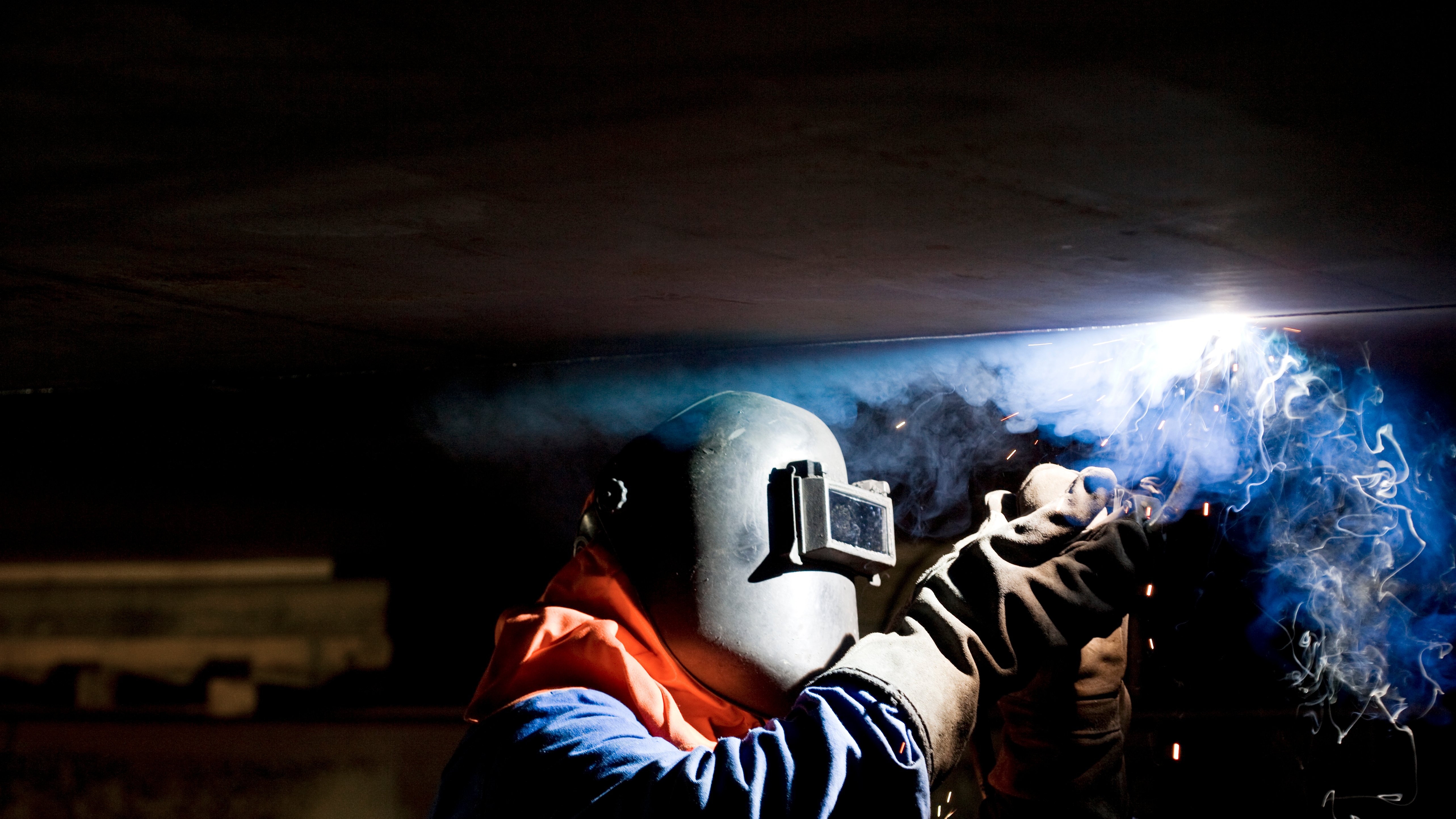 A construction worker conducting hot work