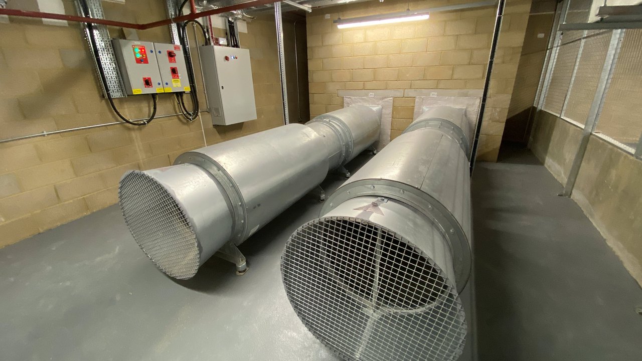 An elevator shaft in a tall, modern building