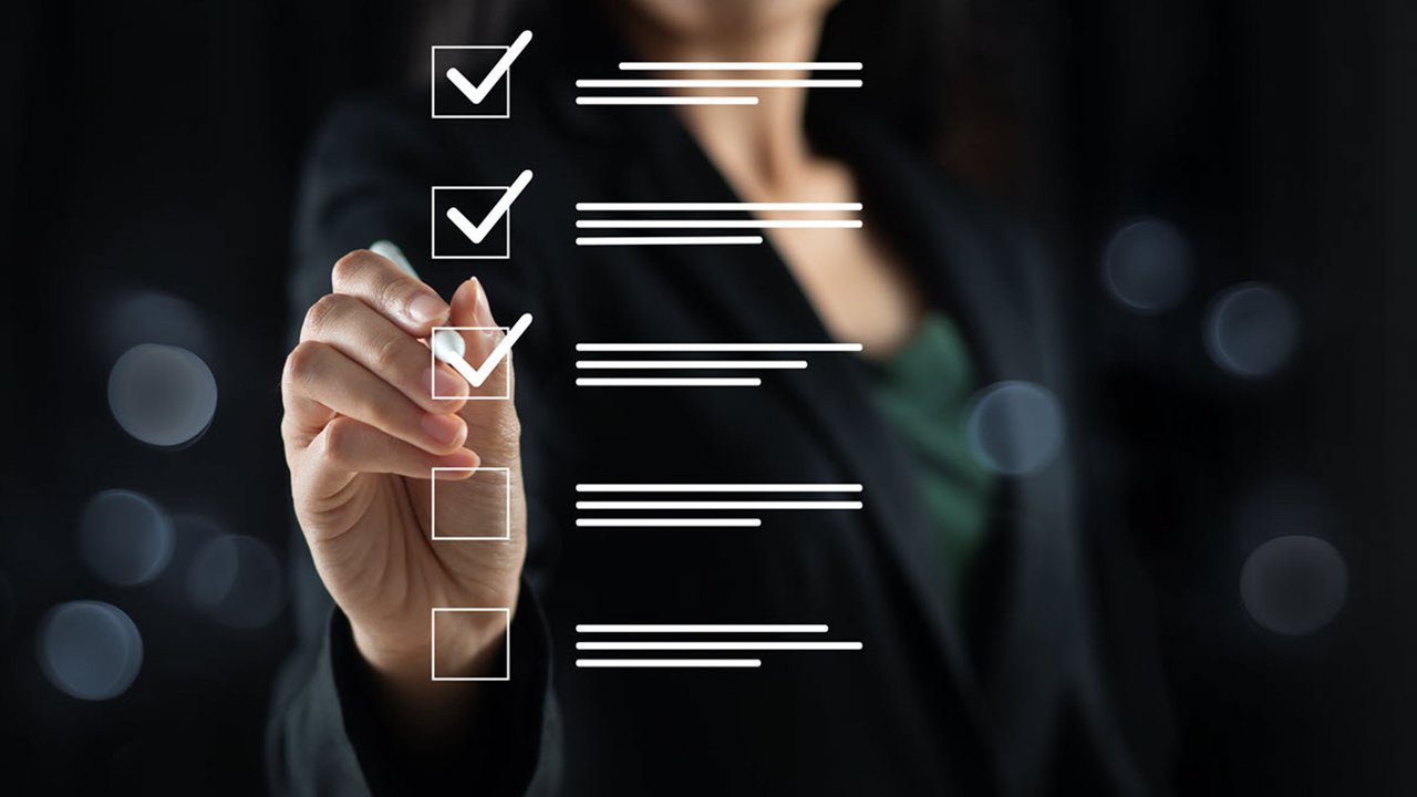 A woman marking off a checklist