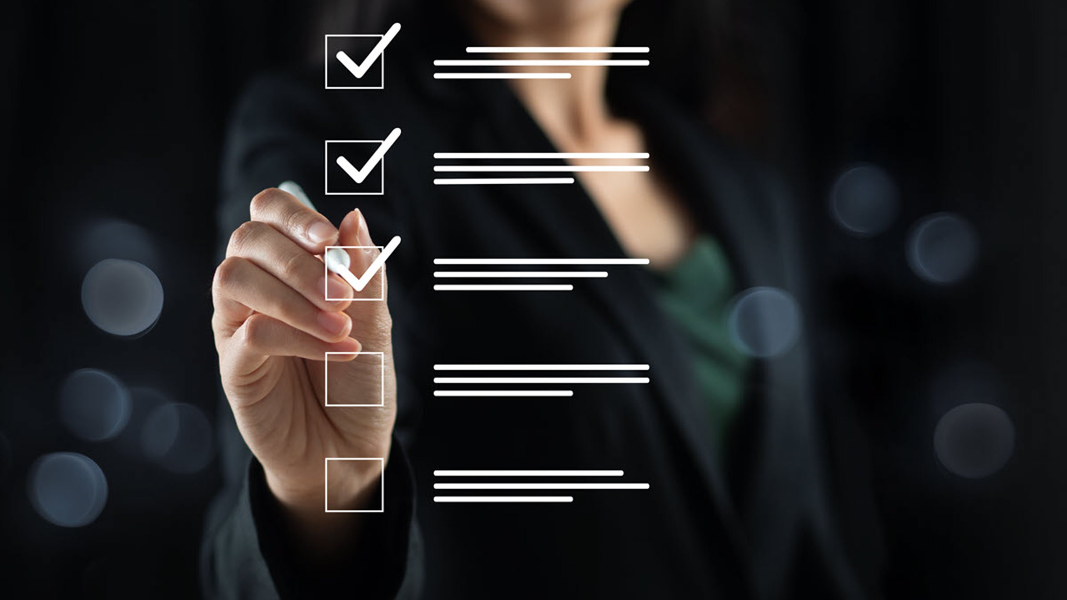 A woman marking off a checklist