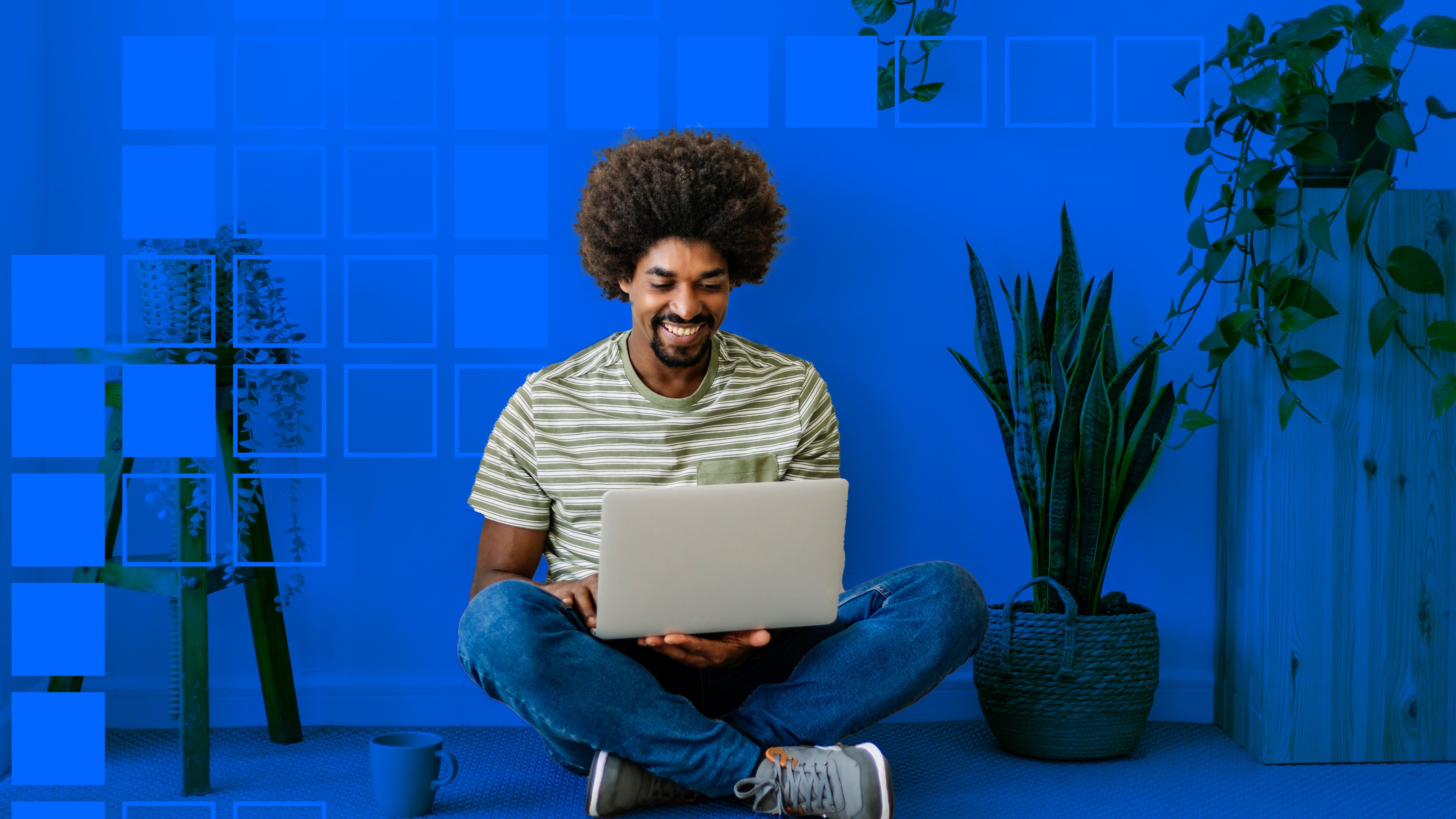 Level up your insurance game with HSB’s Continuing Education webinar series Person using laptop in a blue room