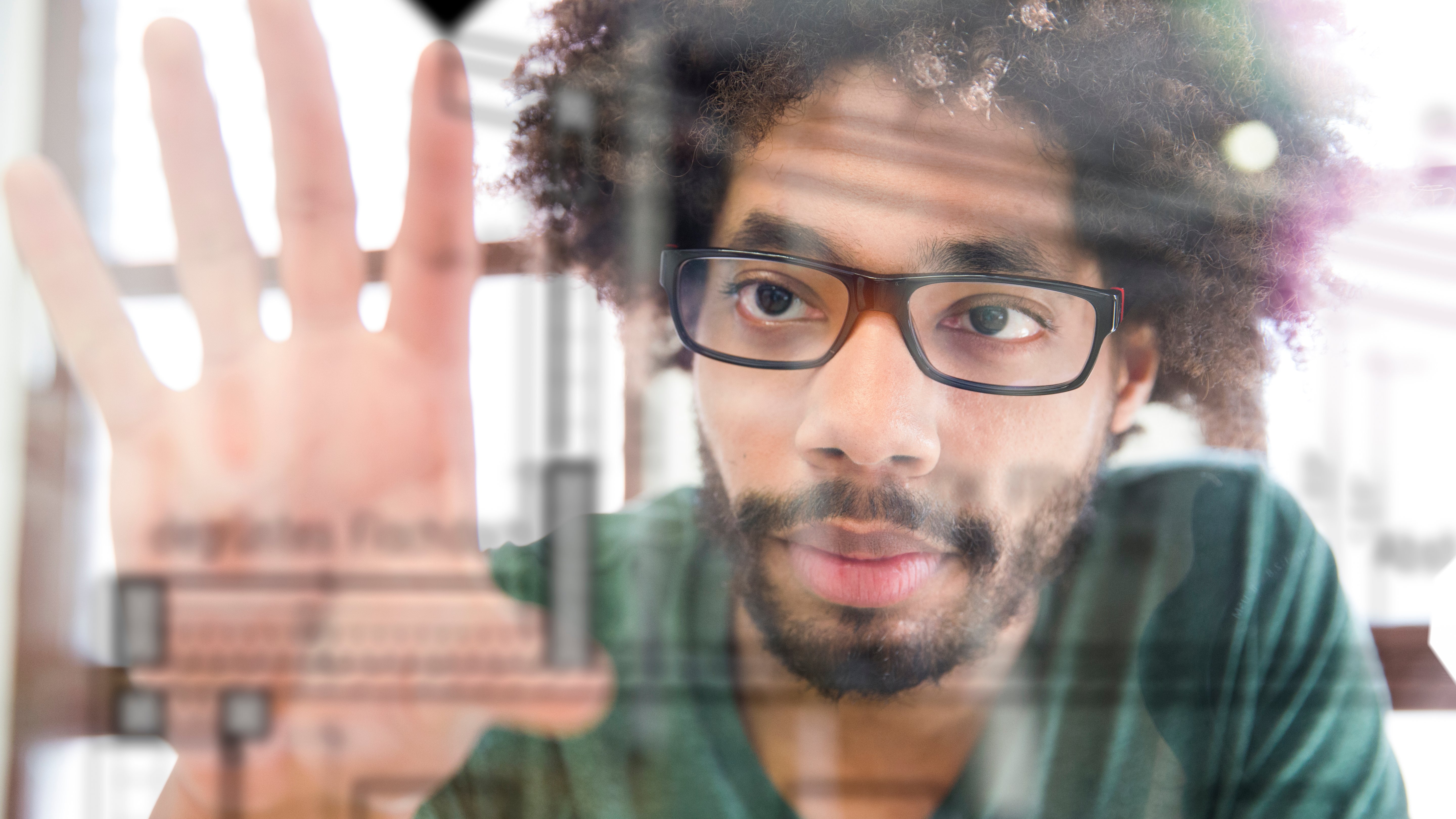 Man interacting with advanced technology screen