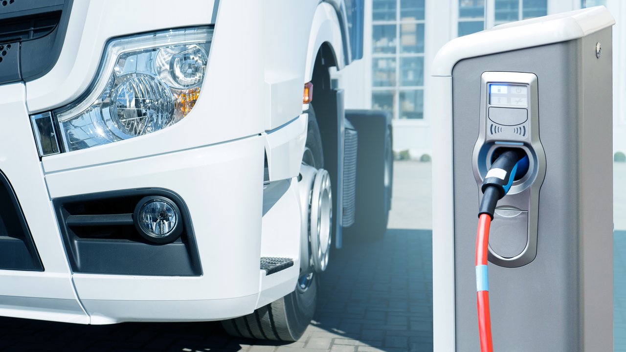 HSB Cyber Survey Finds Electric Vehicles Drive Data Security Fears Electric vehicle charging station with truck.
