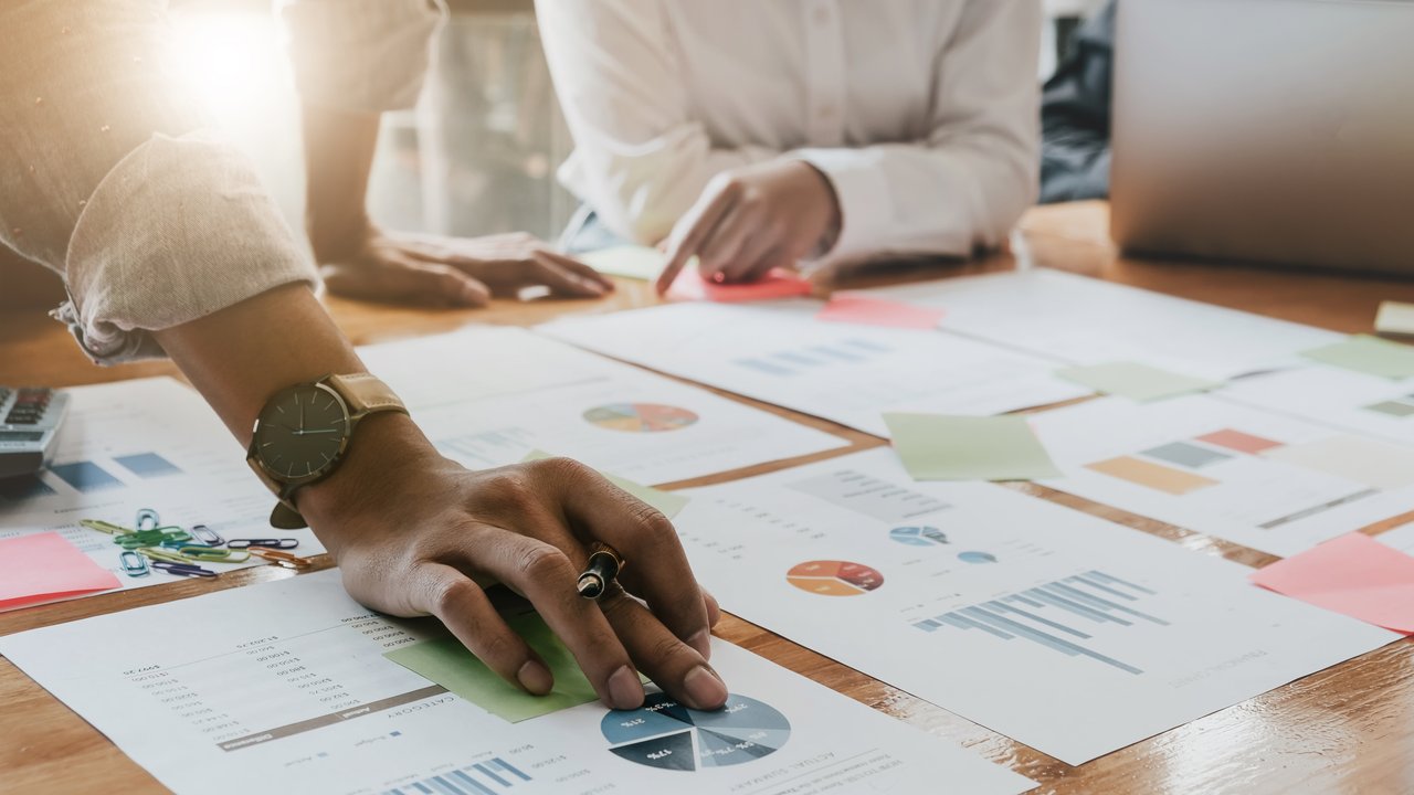 Business People Planning Strategy Analysis from financial document report.