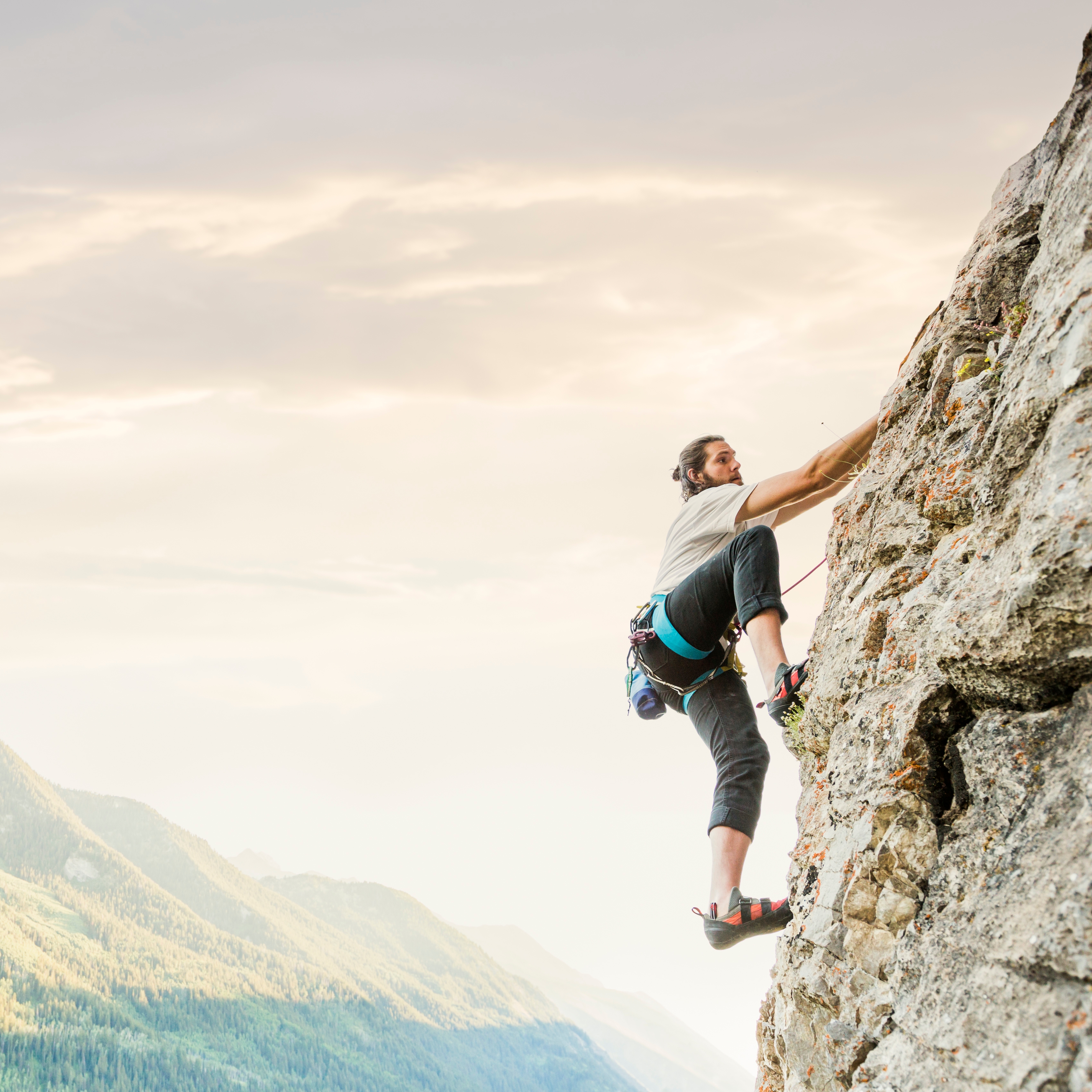 Blurred motion of multi colored lights creating flowing ribbon effect