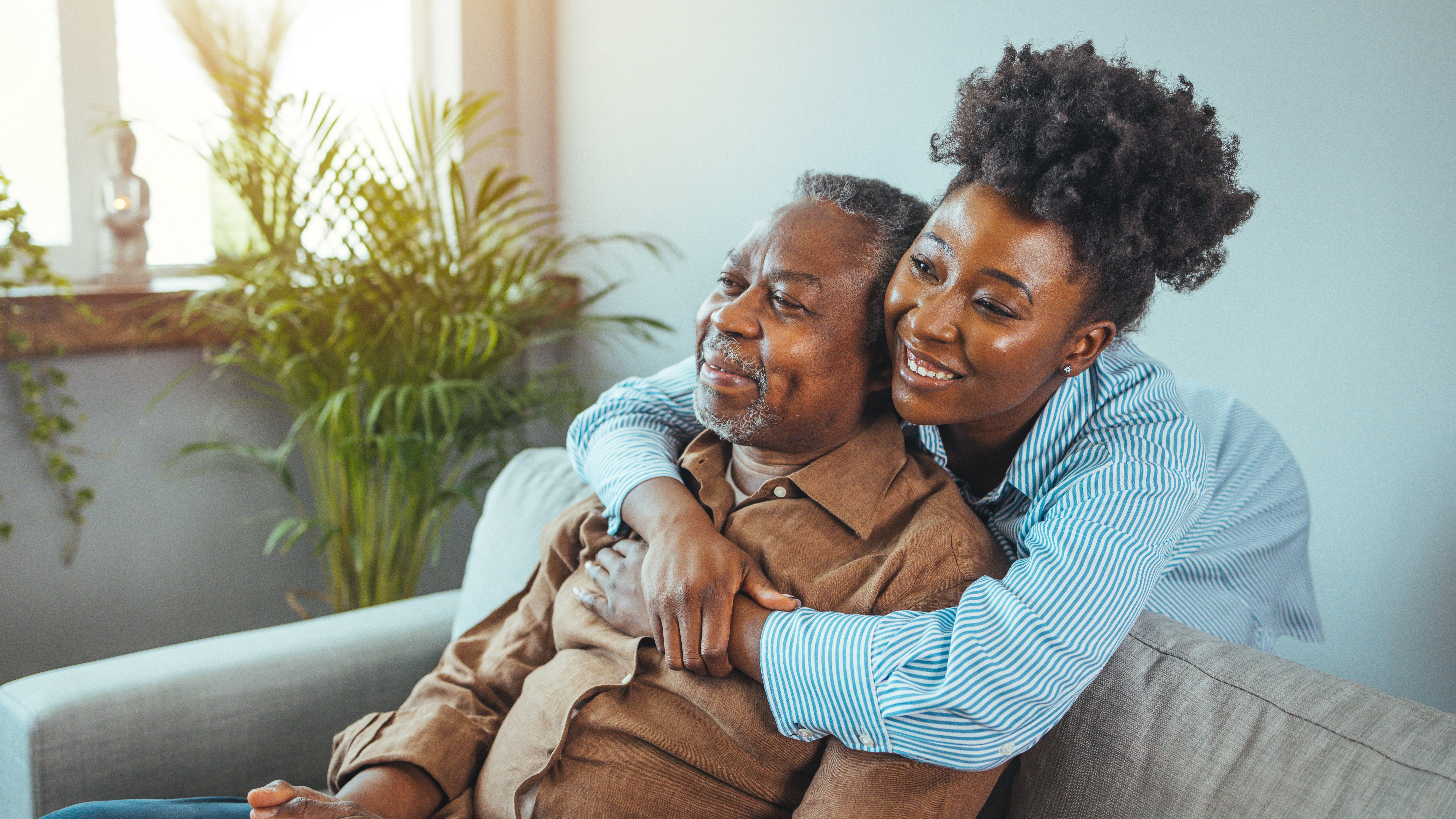 Daughter and father at home