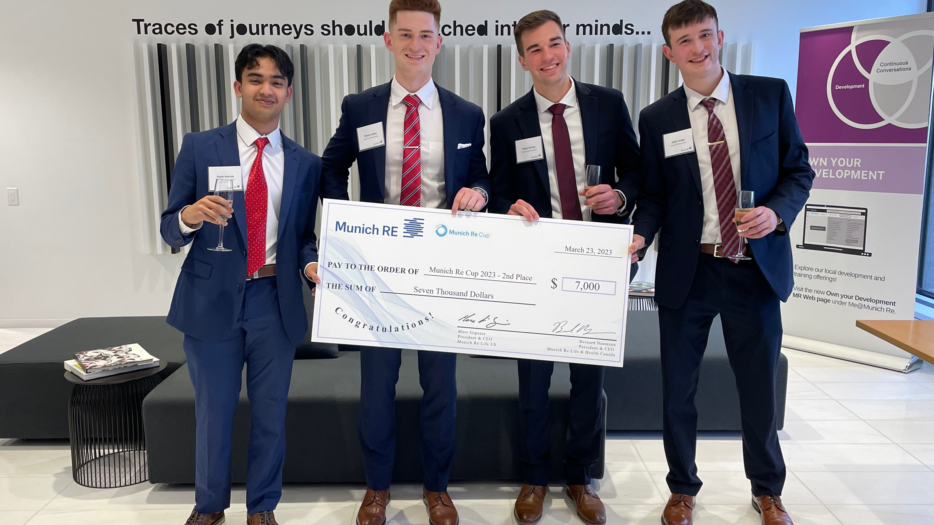 2023 MR Cup Second Place Winners Josh Lange, Parth Amrute, Kevin Konop and David Lattos from the University of Wisconsin Madison posing with their winning check.