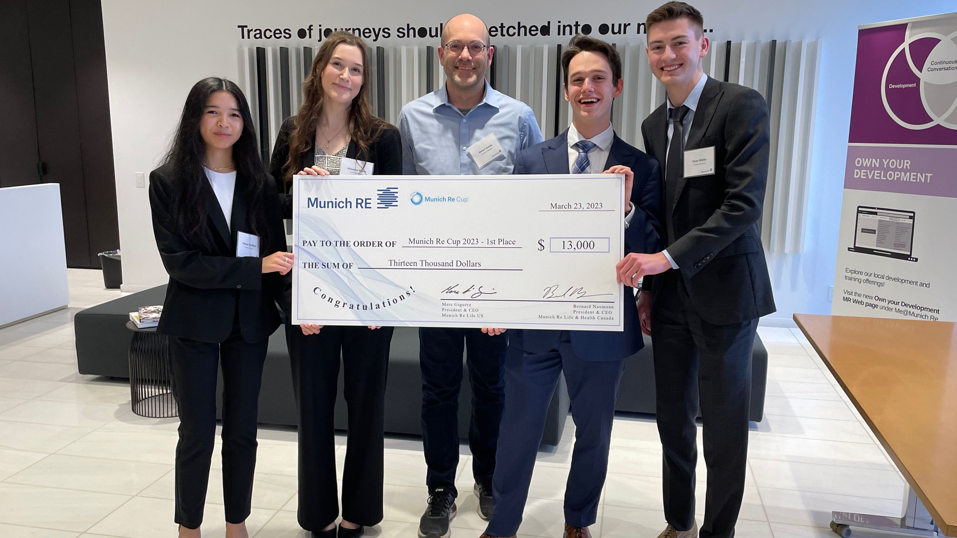 2023 MR Cup Winners Alissane Ruest, Vianca Gamboa, Ryan Wiebe and Conrad Pragnell from the University of Manitoba posing with their Academic Advisor and their winning check.