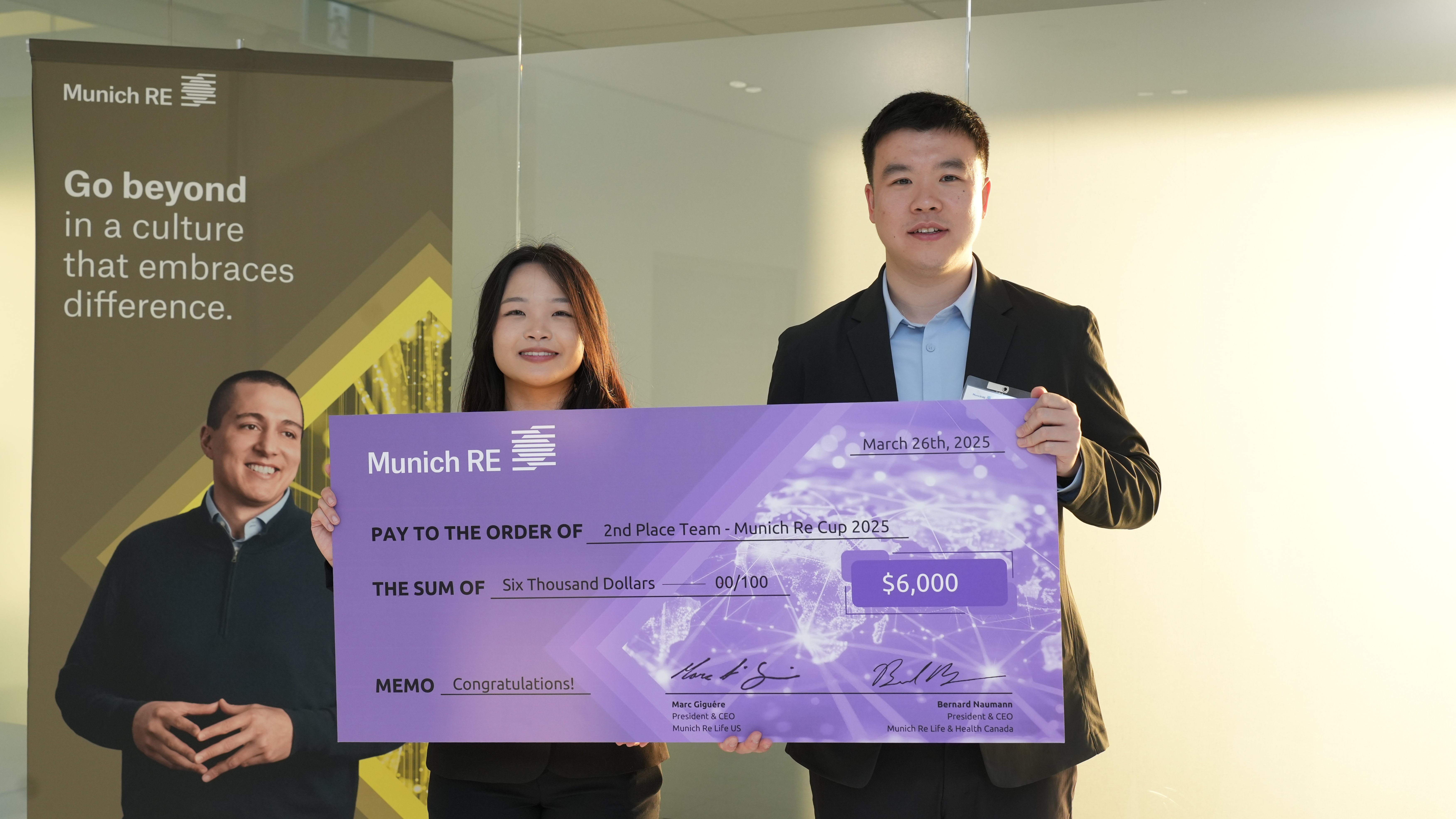 2025 Second-place MR Cup Winners Annie Gu, Yu (Elena) Ban, and Teresa Nguyen from the University of Illinois posing their winning check.
