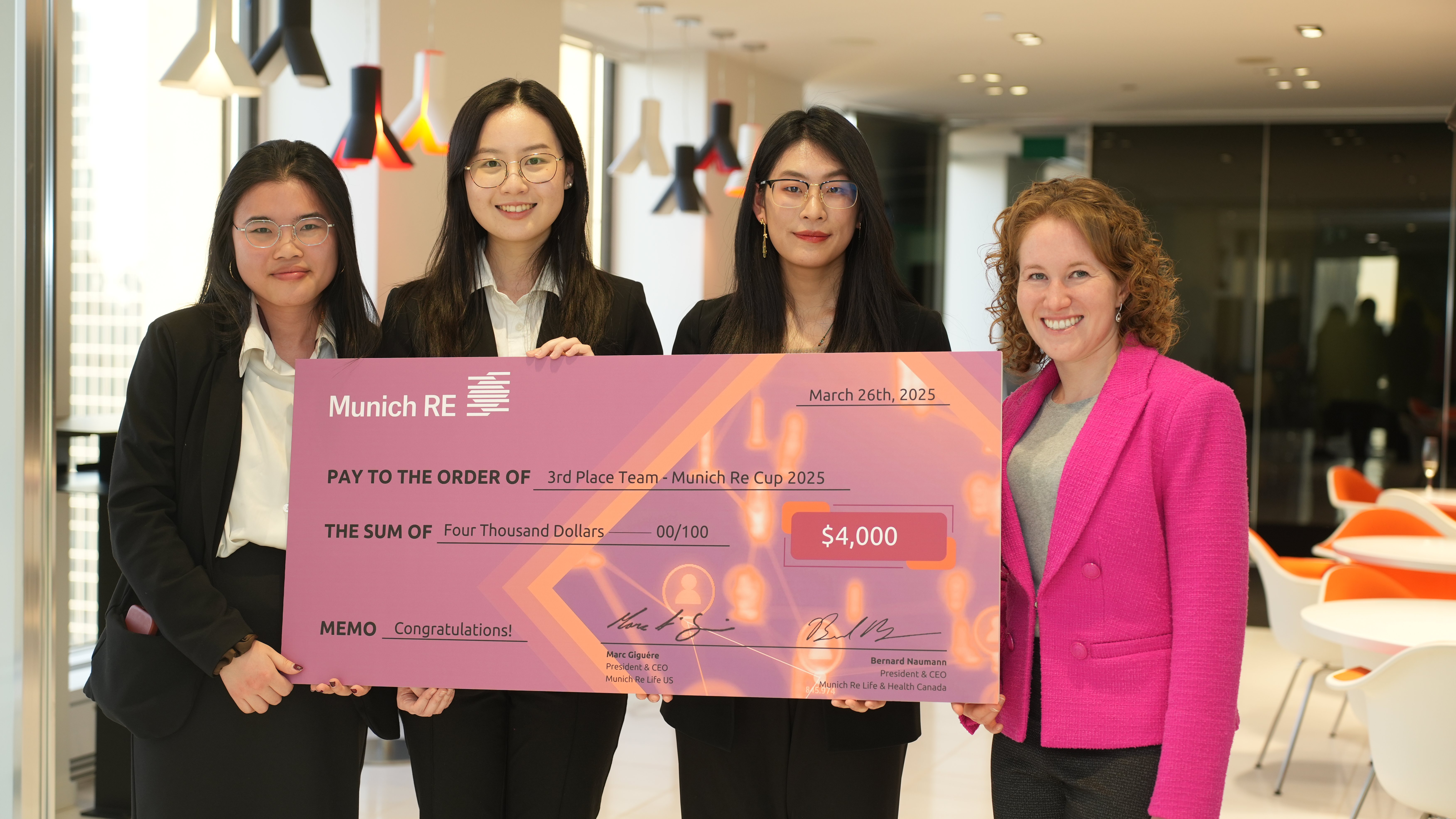 2025 MR Cup Third Place Winners Sue Liu, Yue Zheng, and Bernice Xiao from the University of Waterloo posing their winning check.