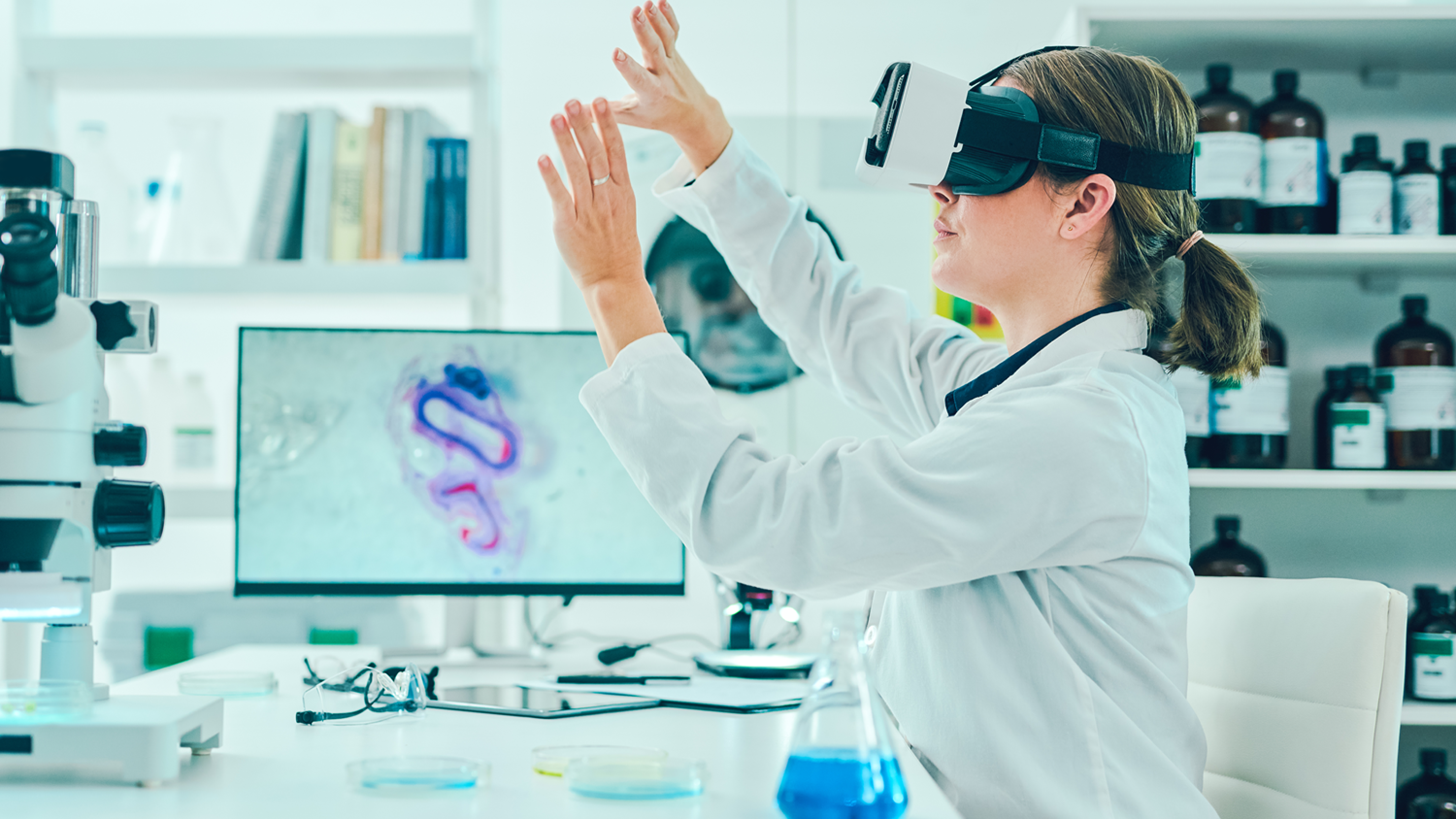 AI in Healthcare AI in Healthcare - Lab technician using a virtual reality headset