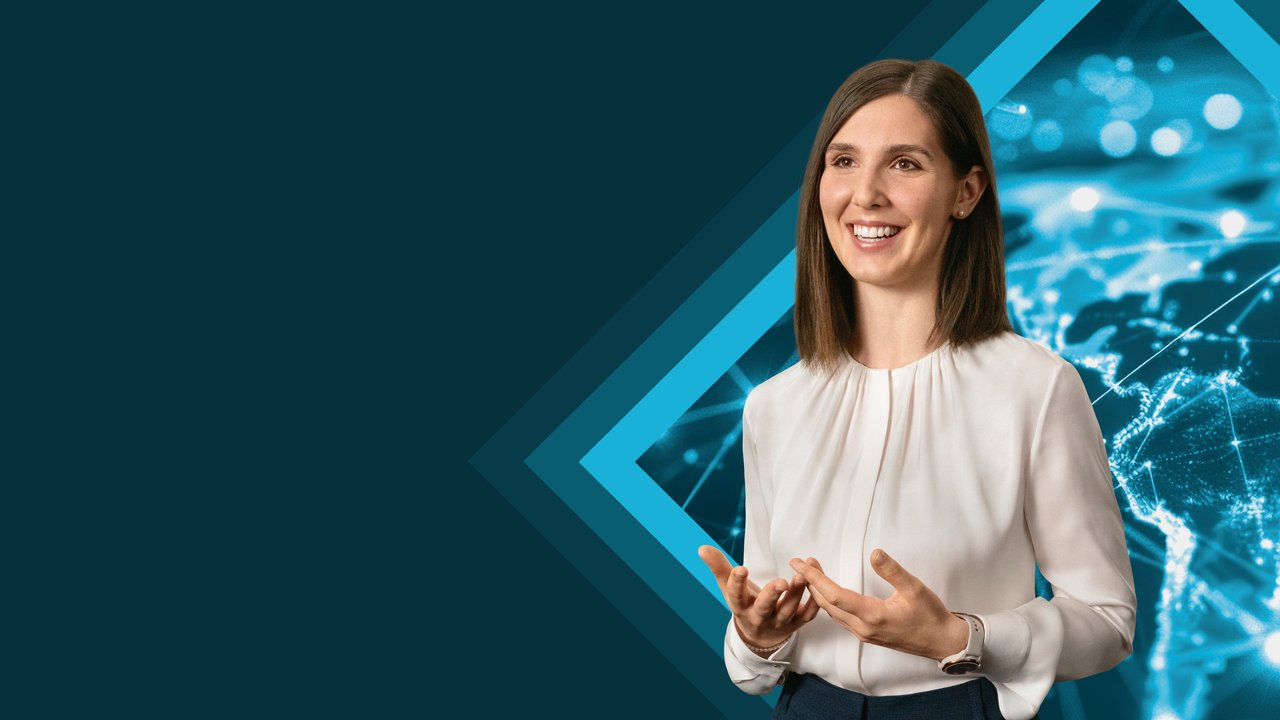 Women smiling with blue background