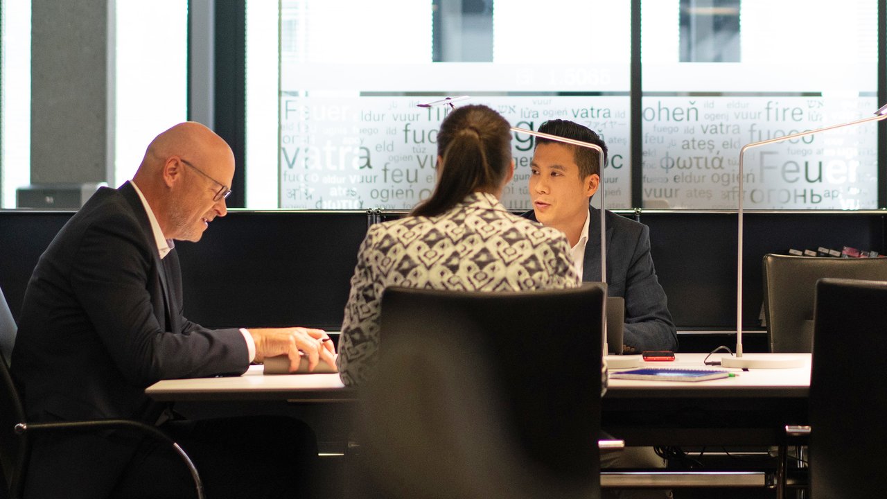 people in office having a meeting