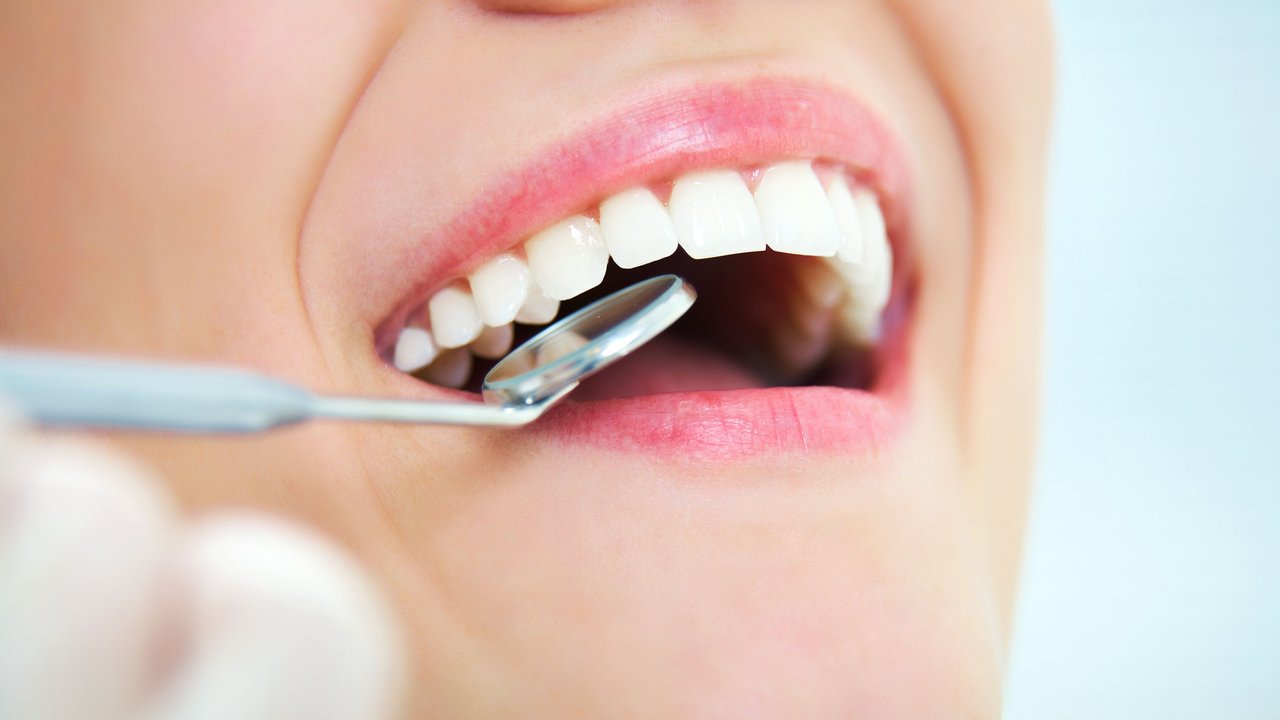 Oral health Woman receiving dental exam