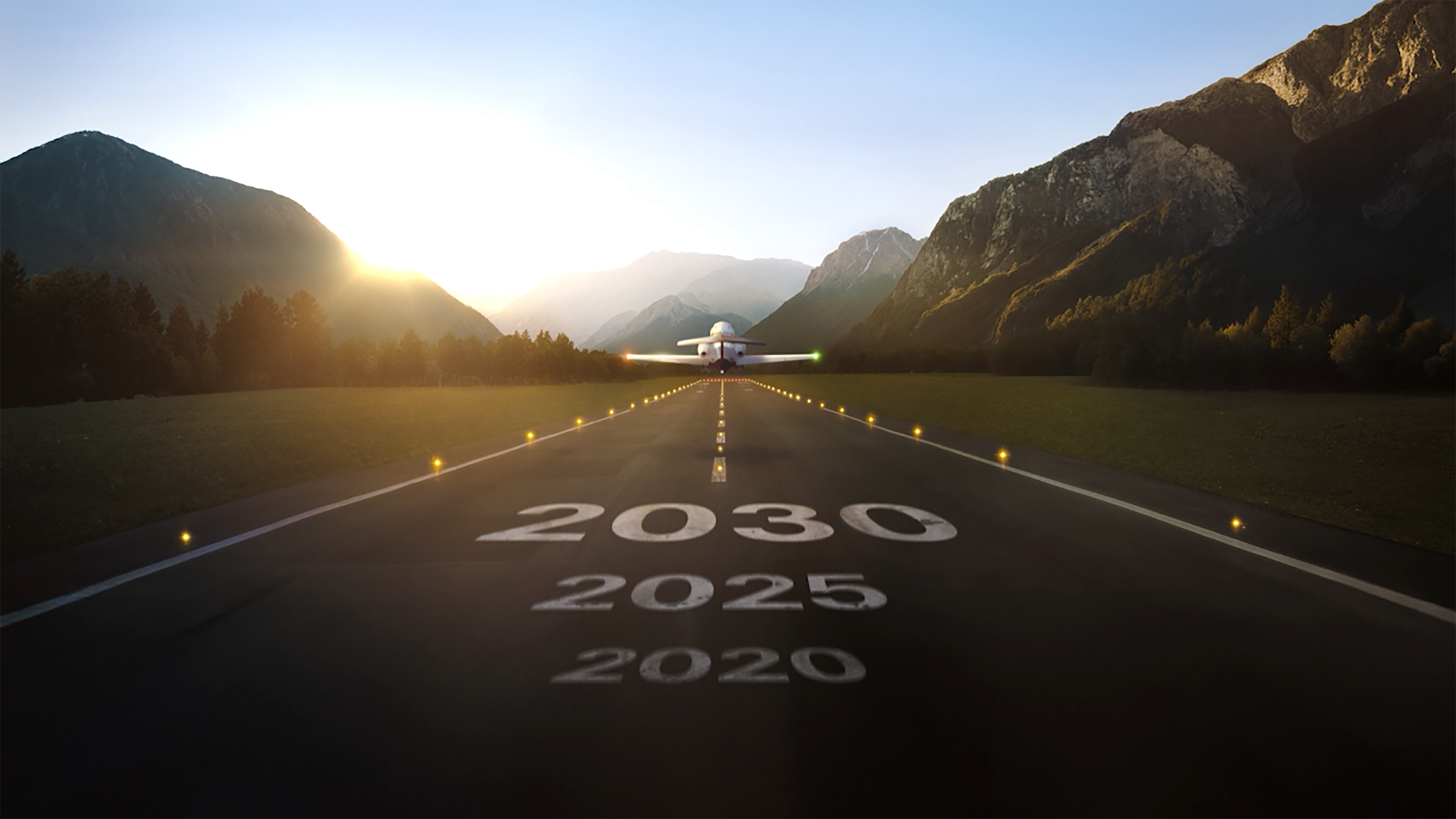 An airplane on a runway with the years 2020, 2025, and 2030 marked on it, surrounded by mountains and sunset.