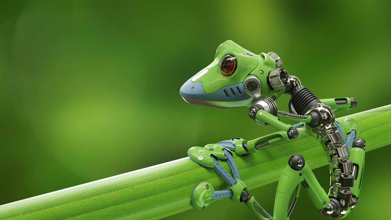 A robotic frog with metallic features sits on a green bamboo stick against a blurred green background.